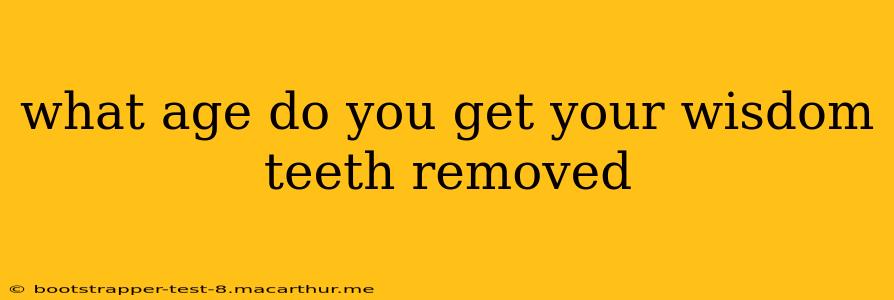 what age do you get your wisdom teeth removed